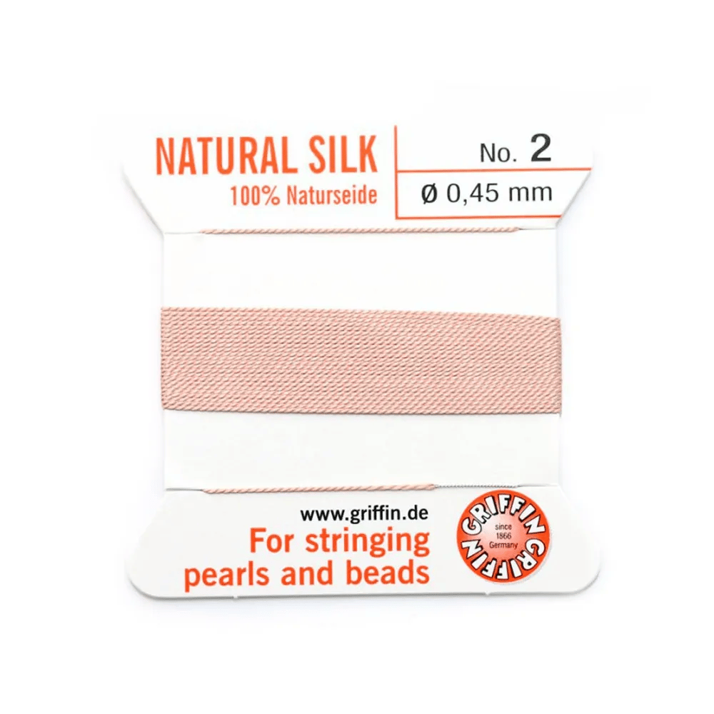 Fil de soie 0.45mm attaché à une aiguille rose pâle x 2m