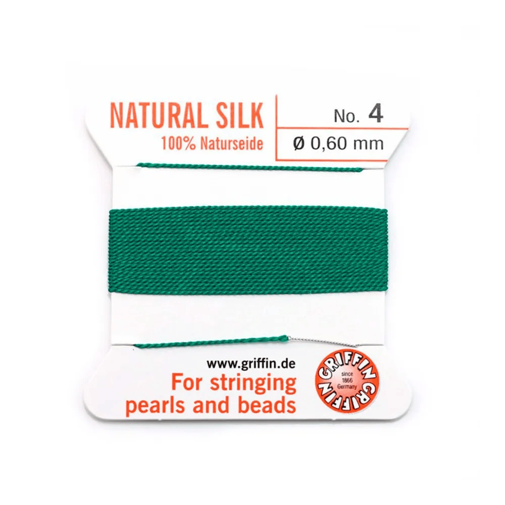 Fil de soie 0.6mm attaché à une aiguille vert  x 2m