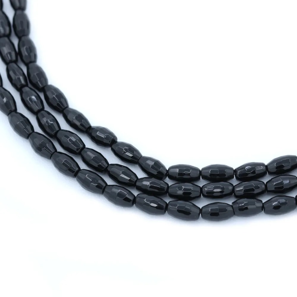 Onyx noir, tonnelet facetté, 4x6mm x 40cm