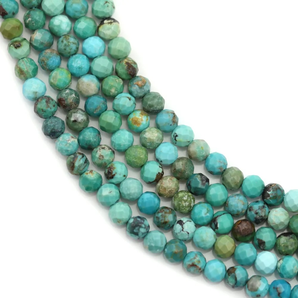 Natural turquoise in the shape of a faceted round 3mm x 40cm
