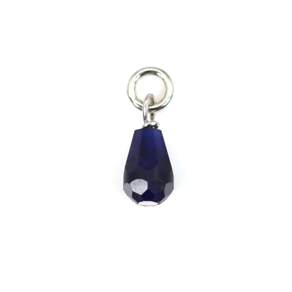 Charm in sodalite sfaccettato 4x6mm - Argento 925 rodio x 1pz