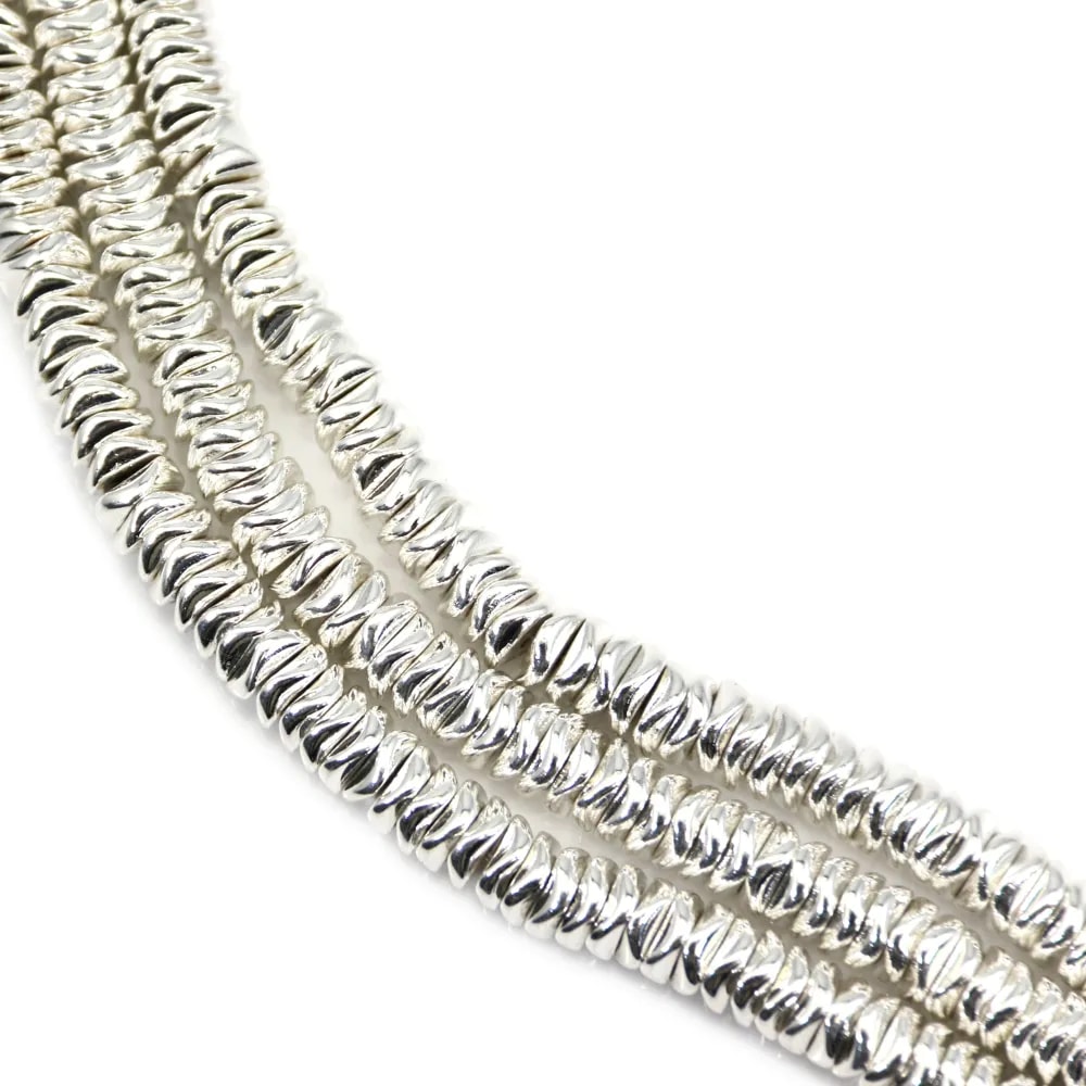 Hematita plateada, disco ondulado 2x6mm x 40cm