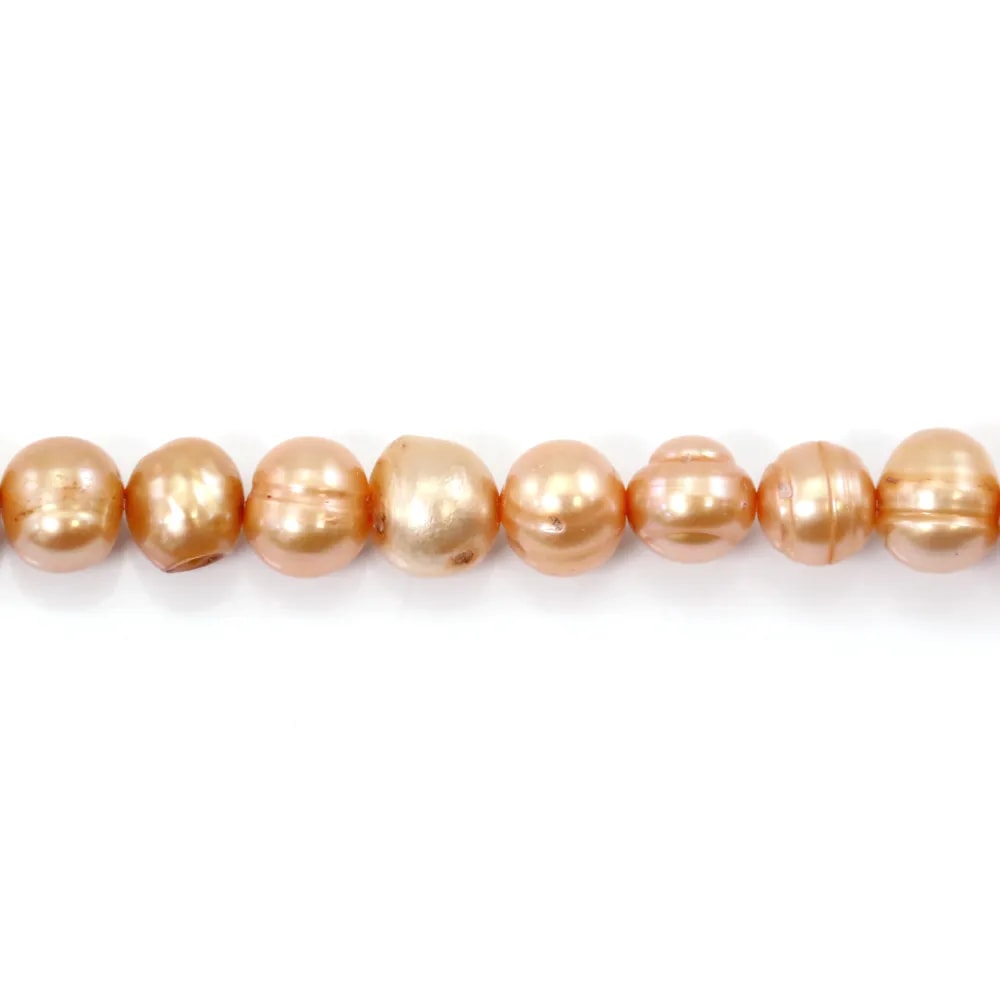 Perles de culture d'eau douce, saumon fantaisie, ovale/cerclée,7-8mm x 40cm