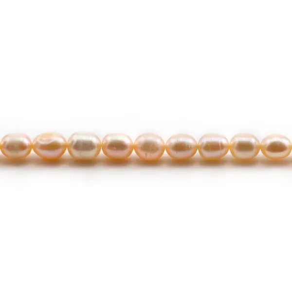 Perles d'eau douce couleur saumon, de forme ovale, 6 - 6.5mm x 10pcs