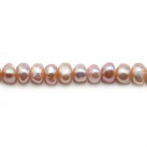 Pinkish oval freshwater pearls on thread 5-6mm x 40cm