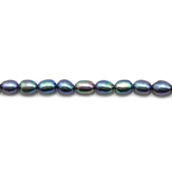 Freshwater pearls colored blue, in oval shaped, 5 - 6mm x 20pcs