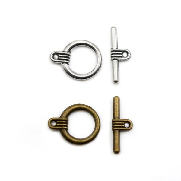 Fermoir "OxT" en métal, de couleur argent vieilli ou bronze 16mm x 2pcs