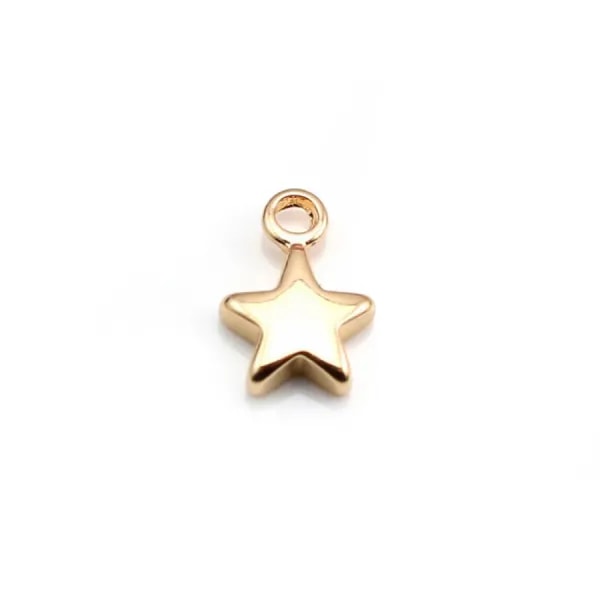Breloque étoile par "flash" or sur laiton 7x10mm x 10pcs