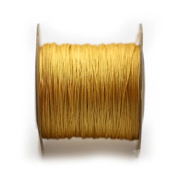 Fil polyester, de couleur orangé, 0.5mm x 180m