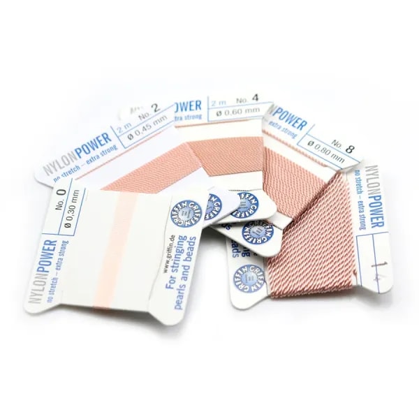 Fil power nylon avec aiguille inclus, de couleur rose pâle x 2m