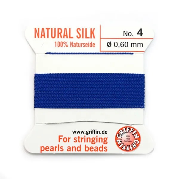 Fil de soie 0.6mm attaché à une aiguille bleu foncé  x 2m
