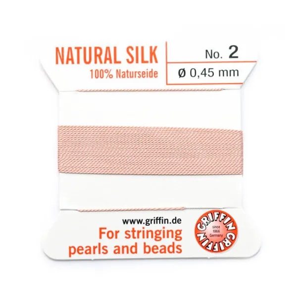 Fil de soie 0.45mm attaché à une aiguille rose pâle x 2m