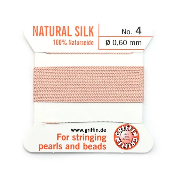 Fil de soie 0.6mm attaché à une aiguille rose pâle  x 2m