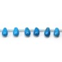 Turquoise reconstituted, in the shaped of a drop, measuring 6 * 9mm x 40cm