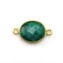 Pierre traitée de couleur émeraude sertie sur argent doré ovale facettée 2 anneaux 11x13mm x 1pc