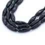 Onyx noir, tonnelet facette, 10.5x30mm x 40cm