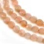 Pierre de soleil orange, de forme ronde plate facetté, 4.5mm x 39cm