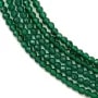 Emeraude synthétique verte, de forme ronde facetté, mesurant 2mm x 40cm