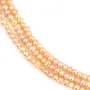 Perles d'eau douce ovales couleur saumon sur fil 4mm x 40cm
