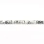 Howlite rondelle hexagonal facetado 3x6mm x 38cm